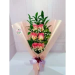 Arreglo de rosas rosadas