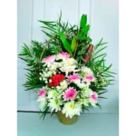 Arreglo condolencias flores rosadas